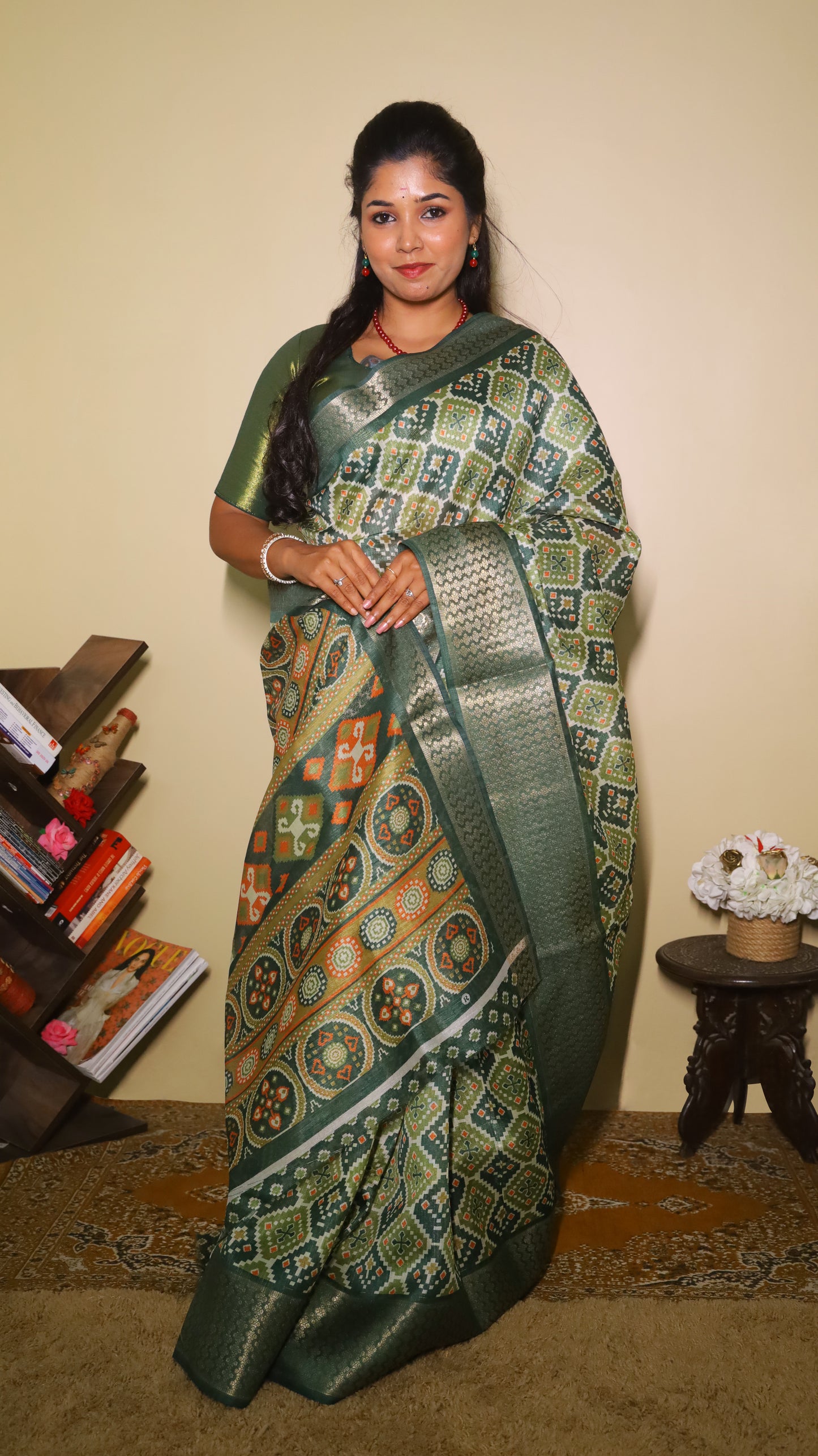 Finest green Kilimanjaro Cotton saree patterned with diamond-shaped motifs in mustard and black and contrast dark green border - BOOMIKA