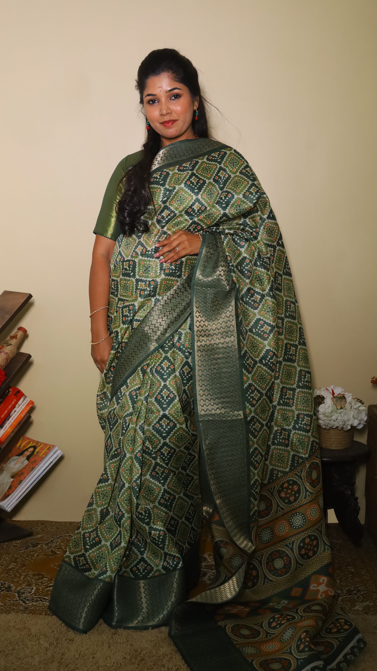 Finest green Kilimanjaro Cotton saree patterned with diamond-shaped motifs in mustard and black and contrast dark green border - BOOMIKA