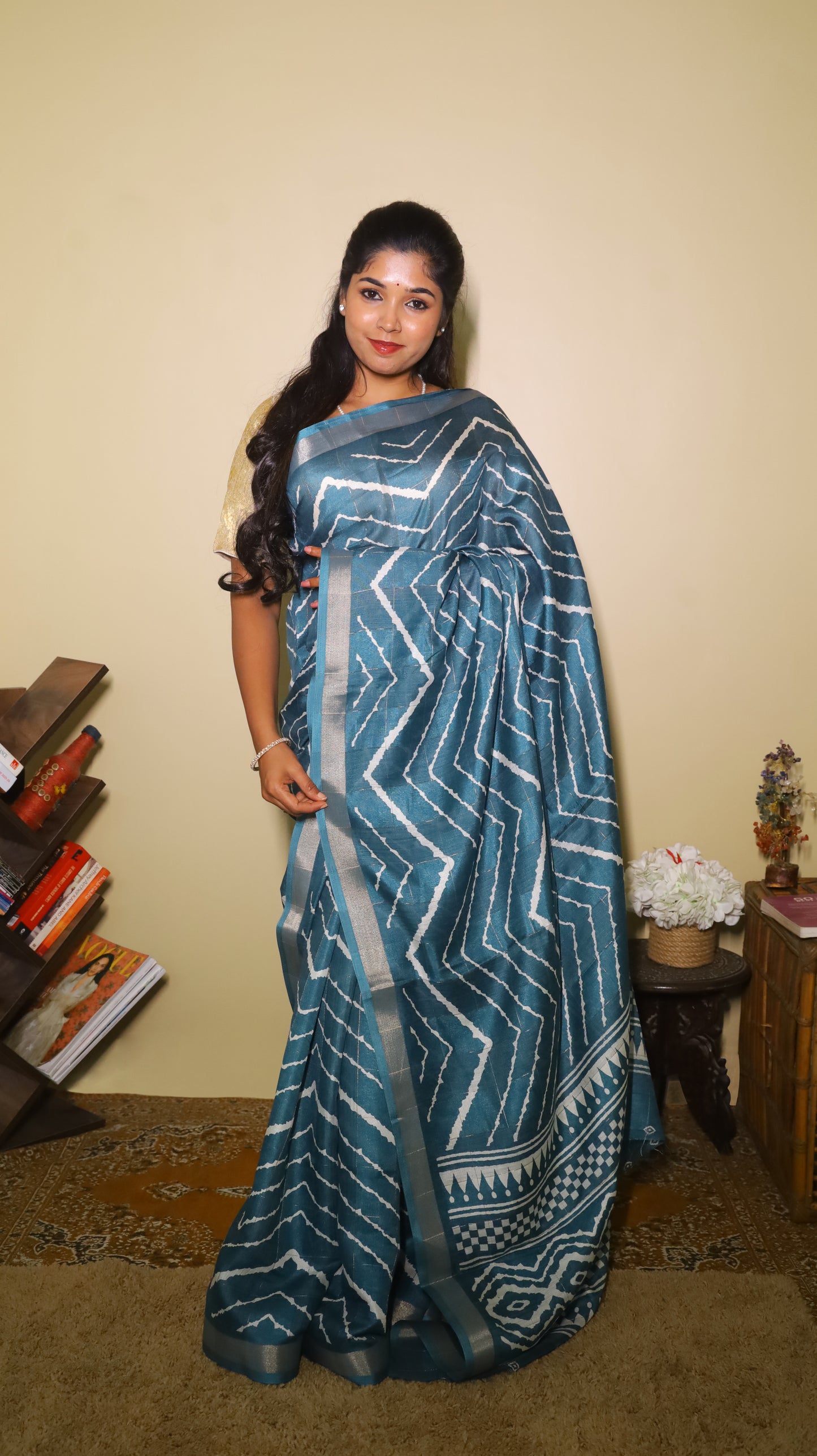 Elegant teal Chanderi Silk Cotton saree designed with bold silver chevron patterns running across the body - VEDHIKA