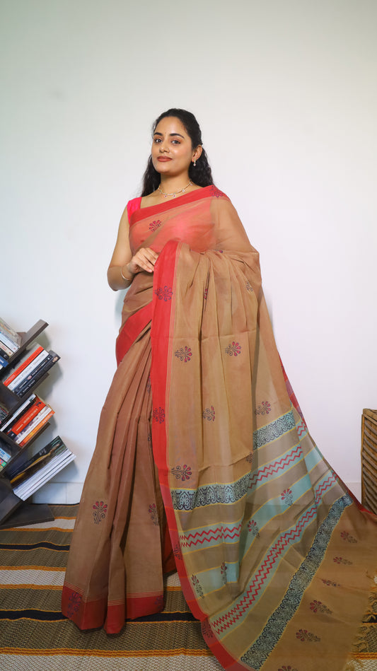 Graceful brown cotton block print saree with delicate floral buttas  - BOOMIKA