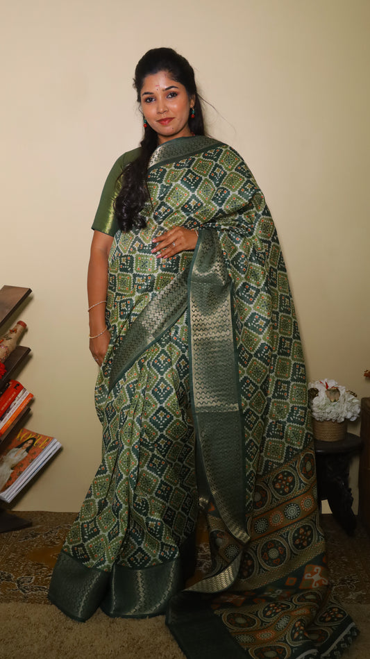Elegant dark green saree