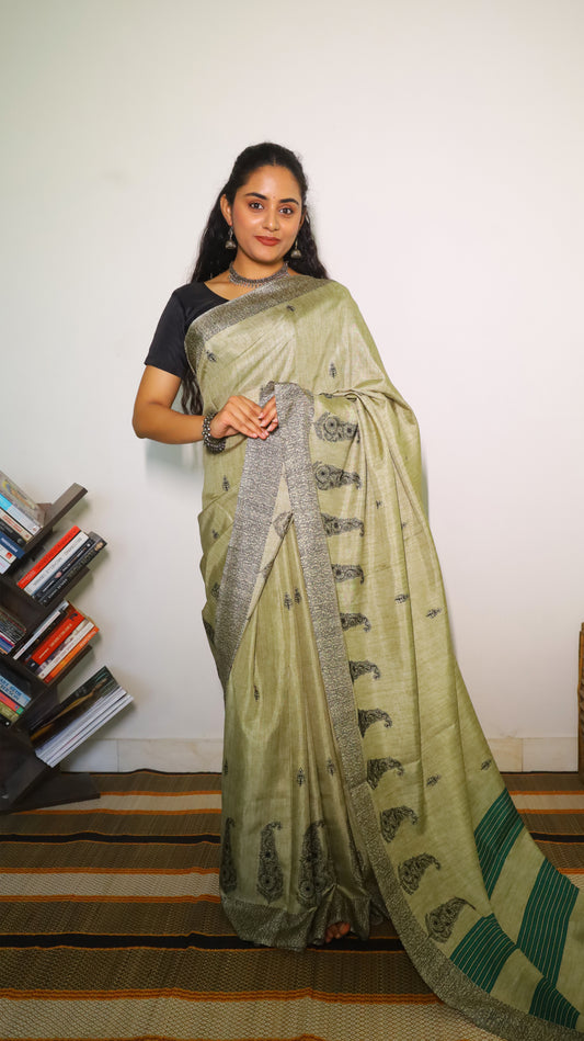 Green embroidered saree