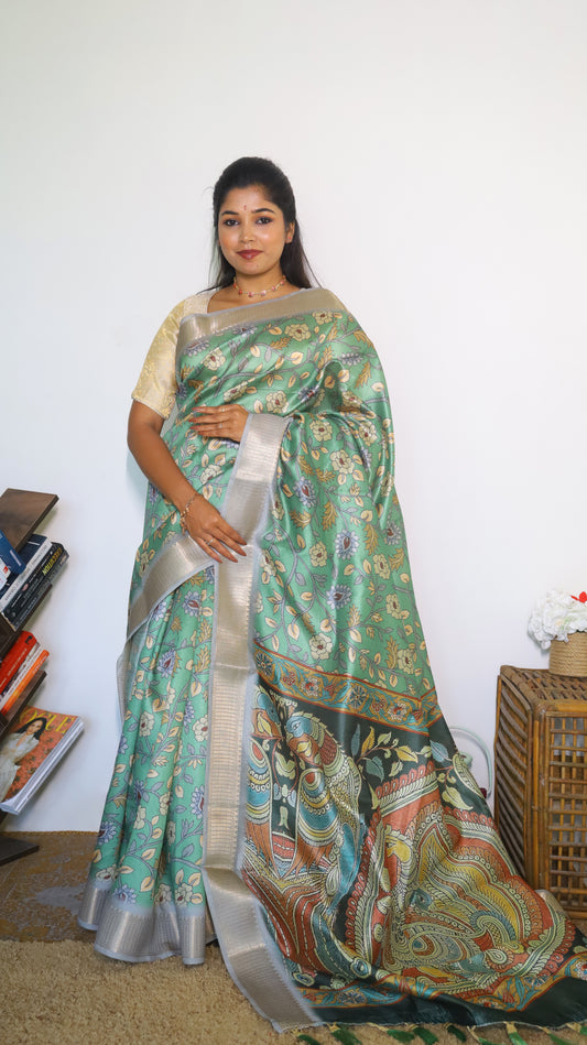 Light green saree with dark green pallu
